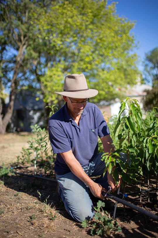 Hugh improving the irrigation system