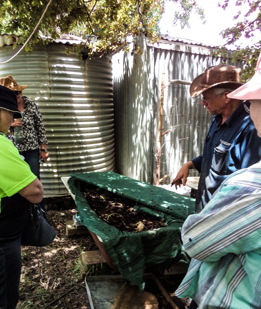 Hugh explaining how to care for your worm farm at a Connecting Country soils workshop held at our place
