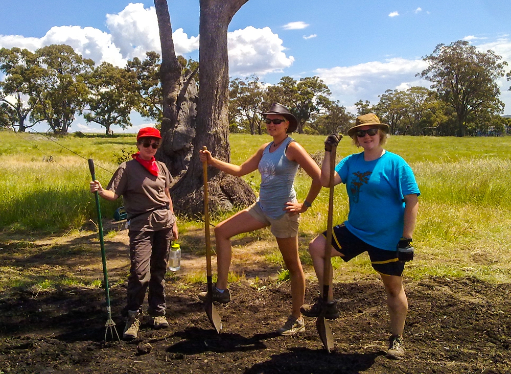 Kirsten, Laura and Melissa hot, dirty, and sweaty after shovelling compost