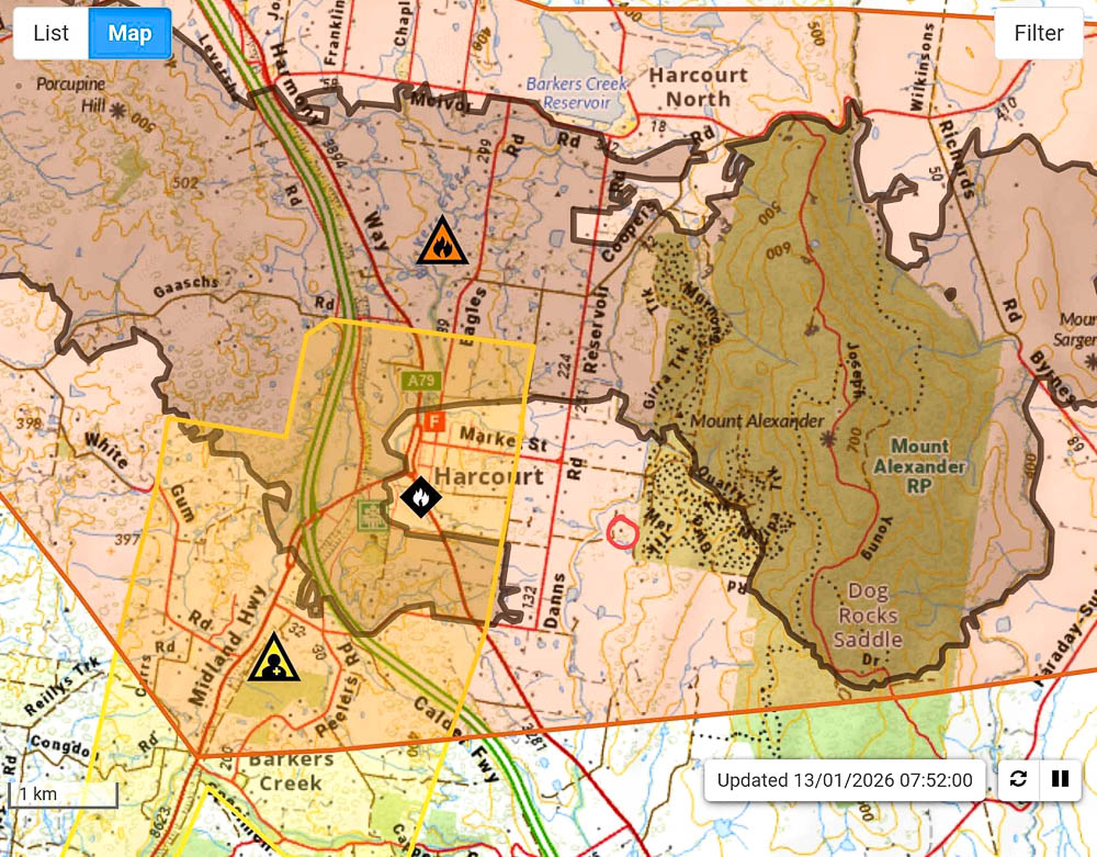 Topographic map showing Harcourt area with yellow shaded region, warning triangle symbols, roads, and Mount Alexander Regional Park marked in green